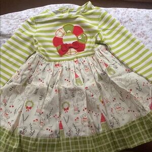 Green and White Striped Dress with Festive Pattern